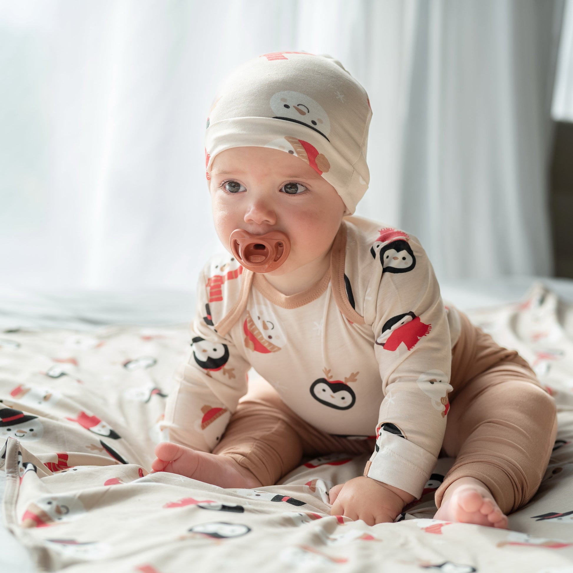 bamboo long sleeve onesie snowy faces print