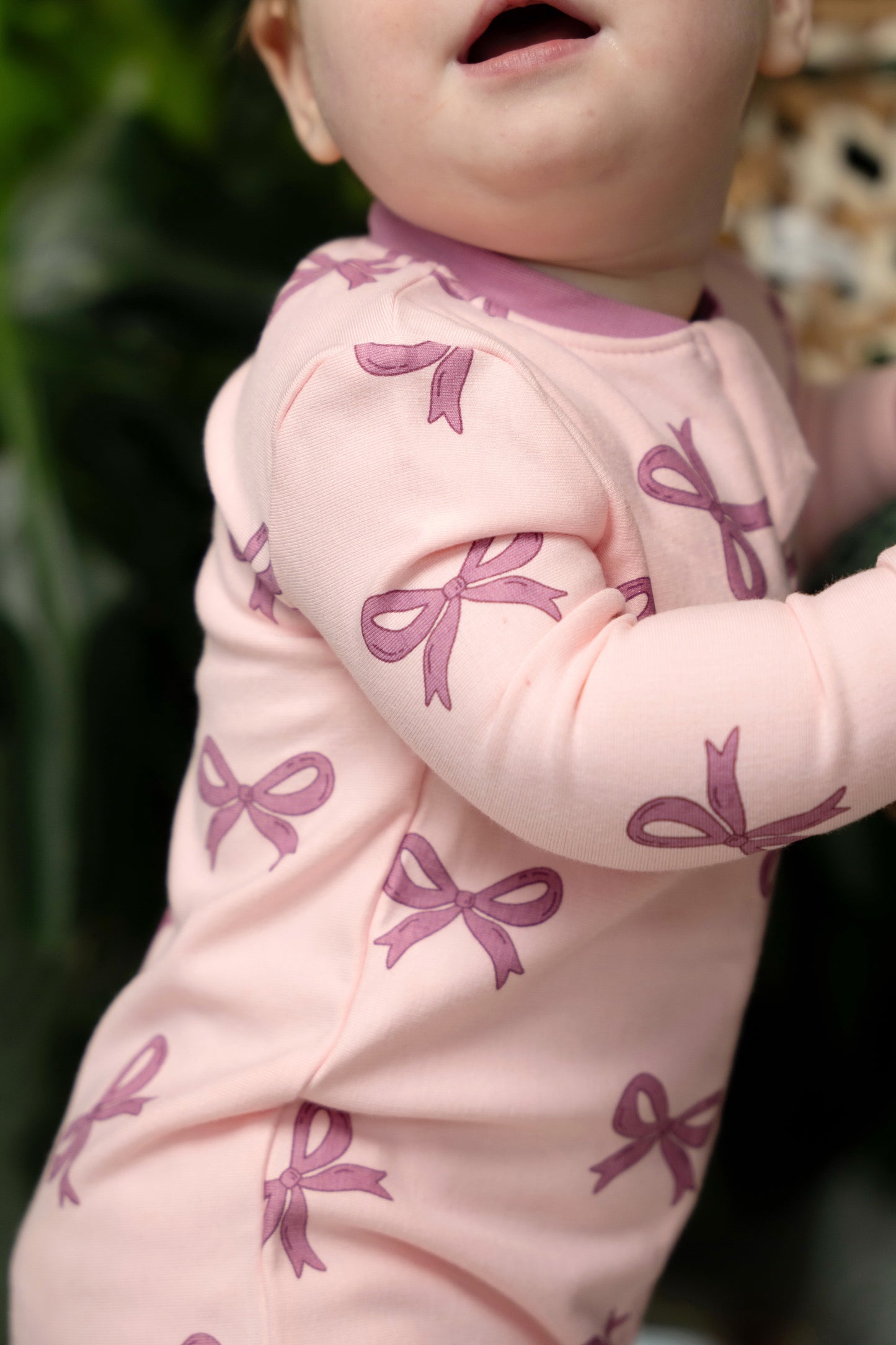 fleece footed sleeper whimsical bow print